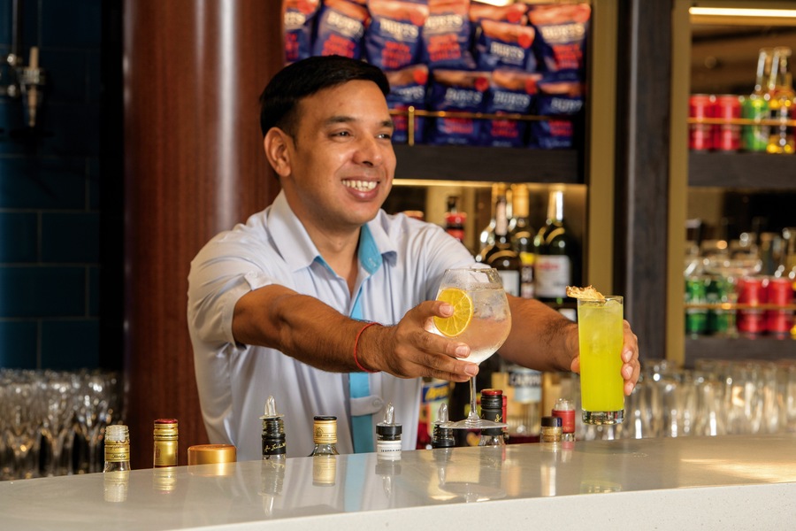 Marella Cruises Marella Explorer 2 Squid & Anchor Bartender With Drinks Lifestyle ©Ben Waller.jpg